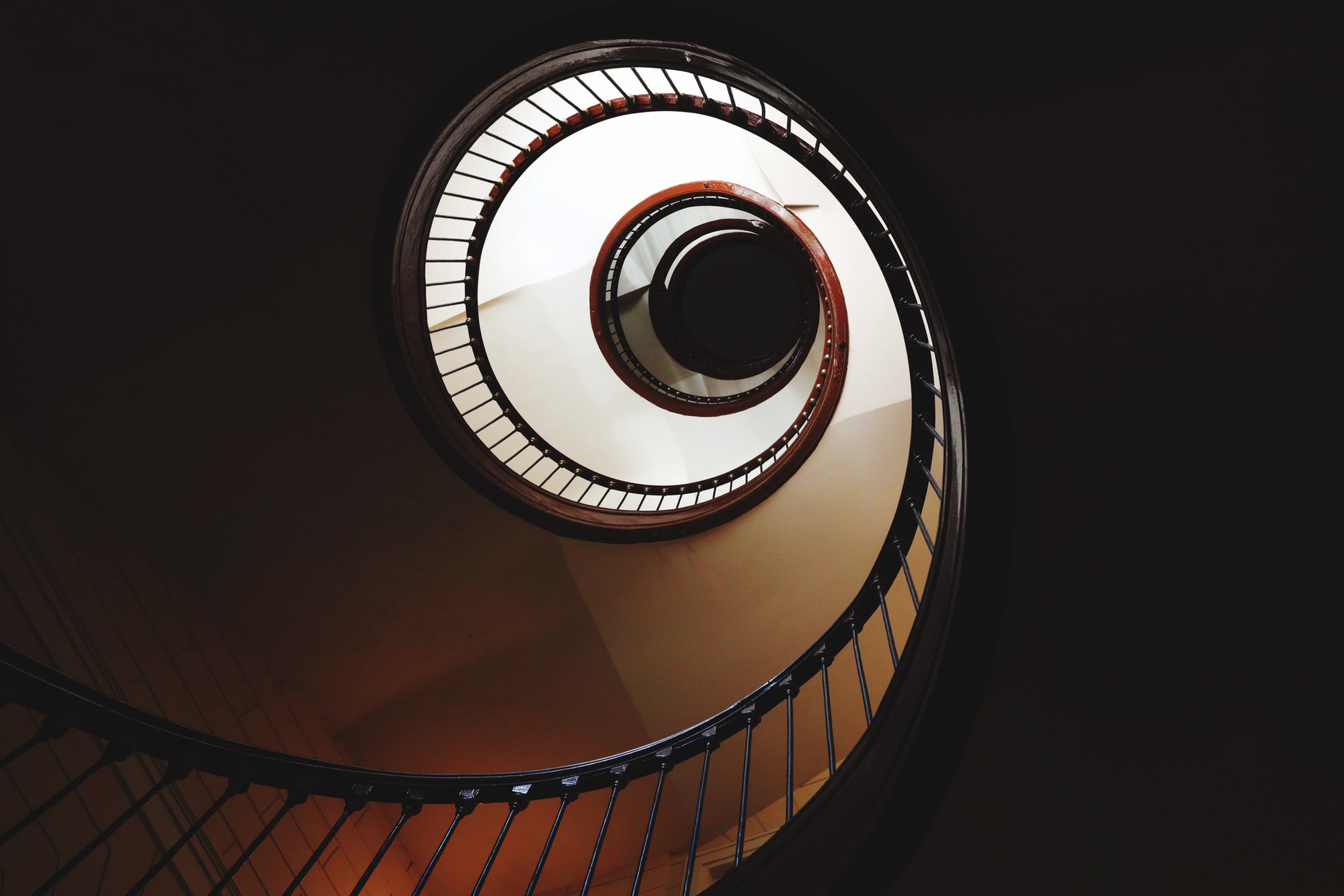 An abstract shot of a spiral staircase
