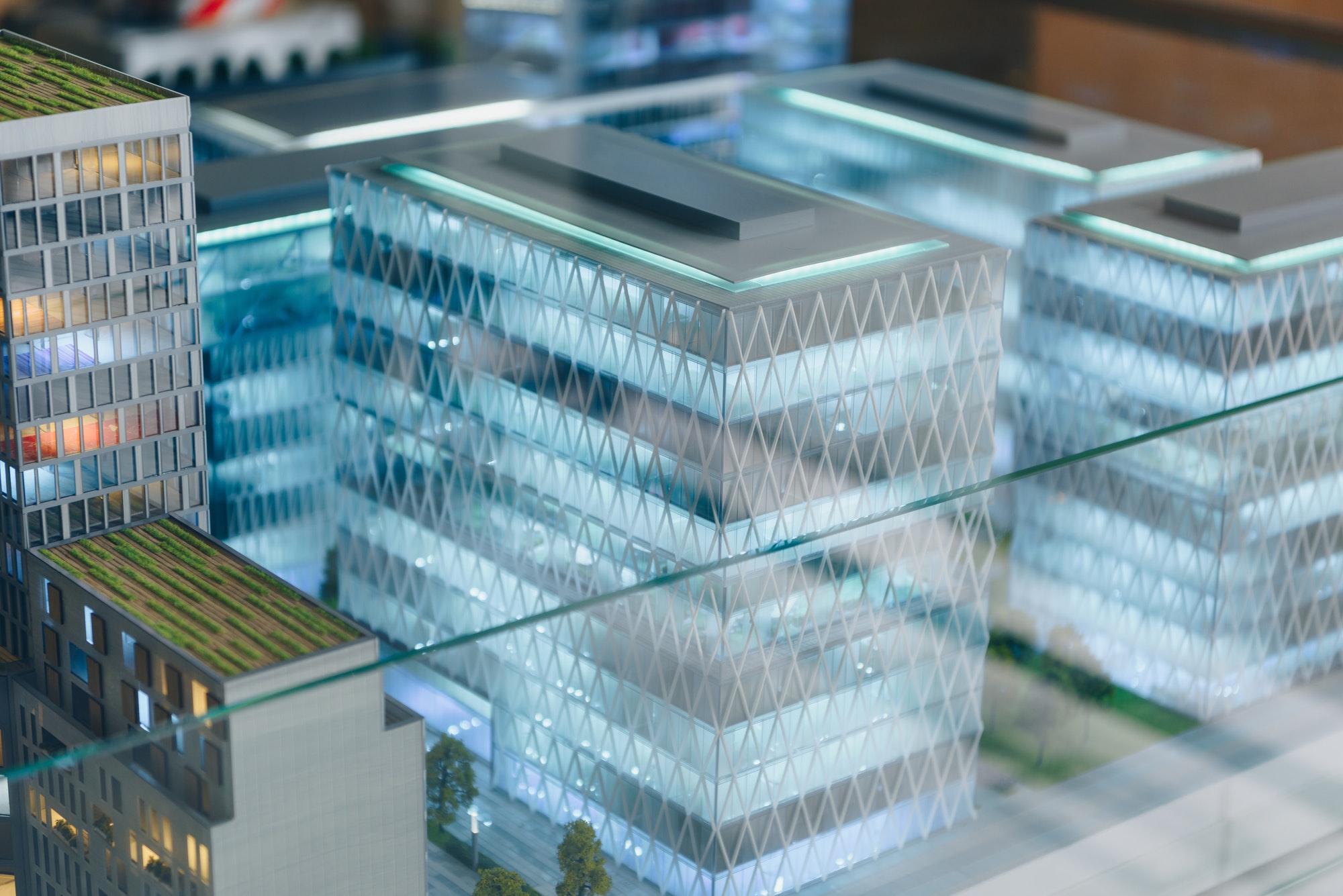 miniature model of modern city under glass